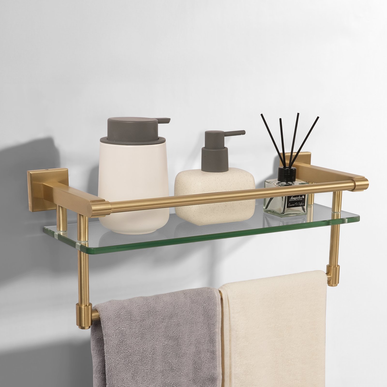 16-inch hanging rod with brushed gold finish and glass shelf.